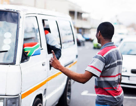 Aerial view of South African taxi rank with minibus taxis showing the vibrant transport economy