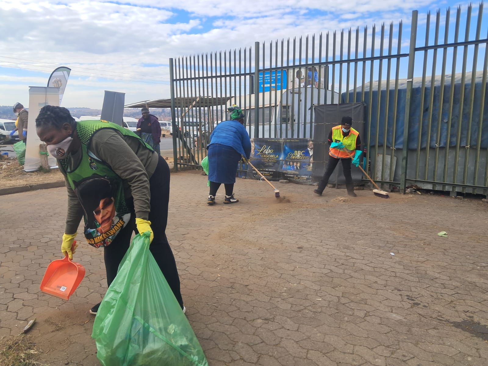 Mandela Day - Volunteers Cleaning Rank Area